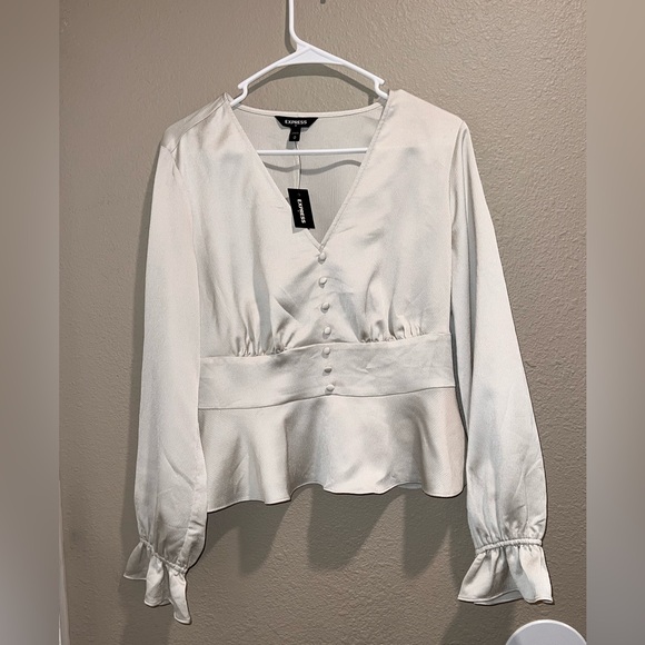 Express Tops - NWT Express Silky Champagne Peplum Top size Medium.